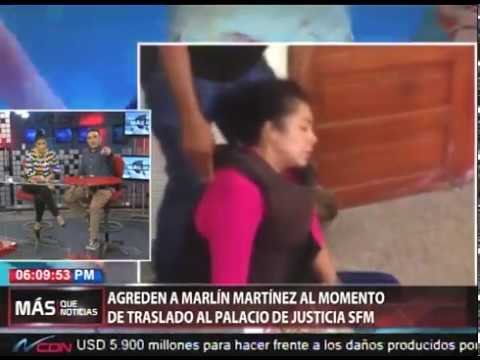 Agreden a pedradas a Marlín Martínez al momento de traslado al Palacio de Justicia SFM