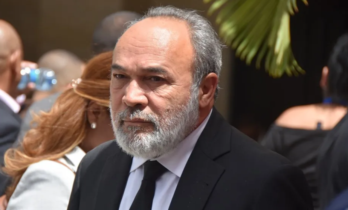 Pagán entregó al Ministerio Público RD$10 millones que un funcionario le dio en una funda negra; también cedió un Audi, una yipeta Volvo y otra BMW