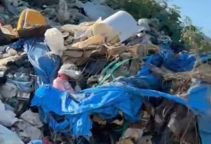 Vertedero a cielo abierto en San Luis genera denuncias por riesgos a la salud y contaminación del río Ozama